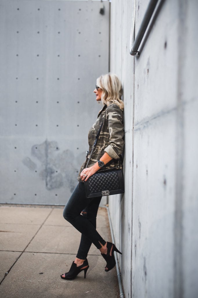Camo Jacket and black ripped jeans