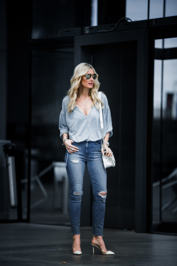 Dallas Fashion blogger wearing free people top and ripped jeans