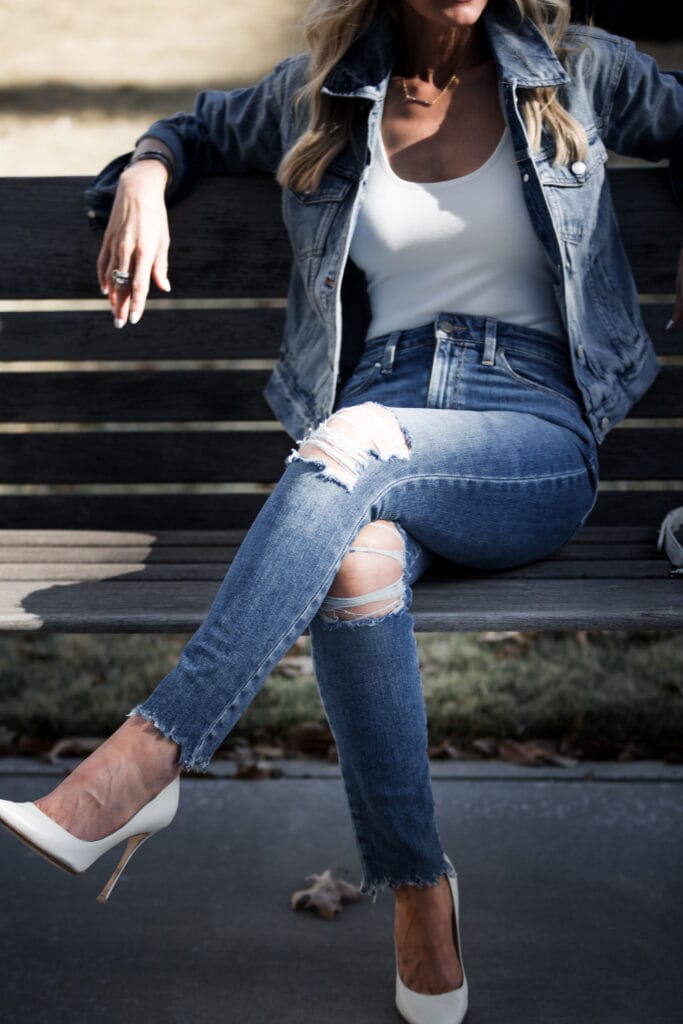 Heather Anderson wearing white pumps and ripped jeans