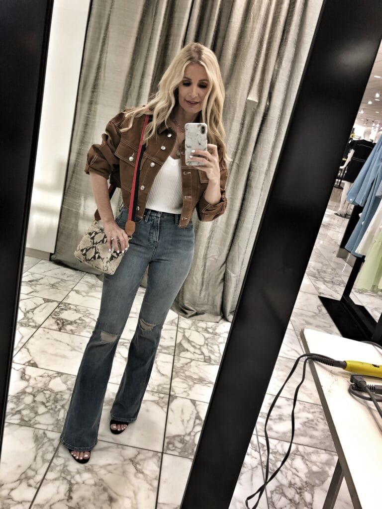 Dallas blogger wearing Good American Flare jeans