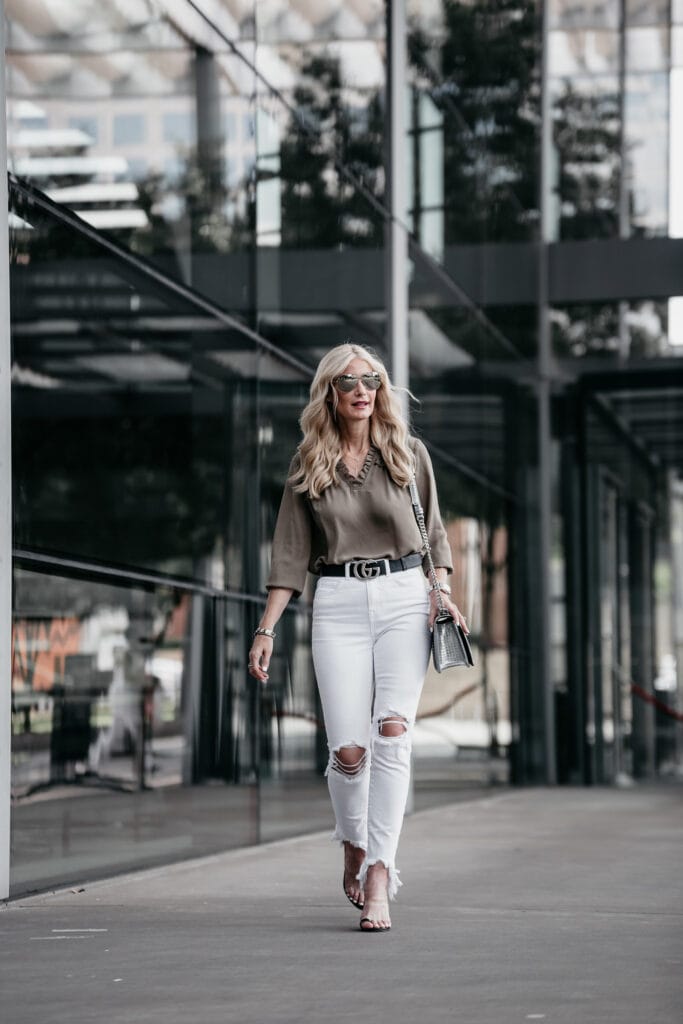 Ivanka Trump top, white jeans, and Gucci belt