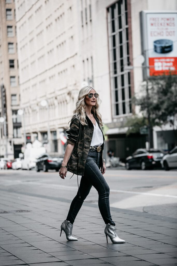 Veronica Beard silver booties, Camo jacket, and gray jeans