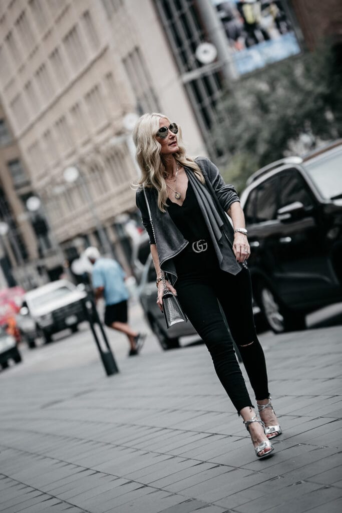 Dallas style blogger wearing Gucci belt and black jeans