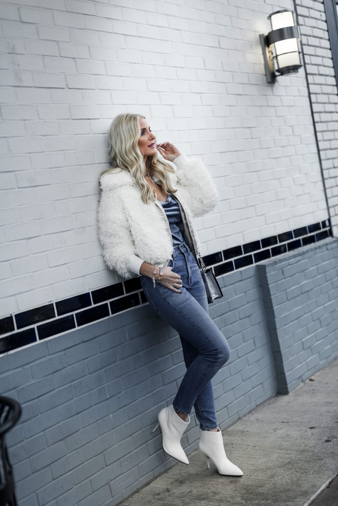 Dallas style blogger wearing Reformation faux fur jacket