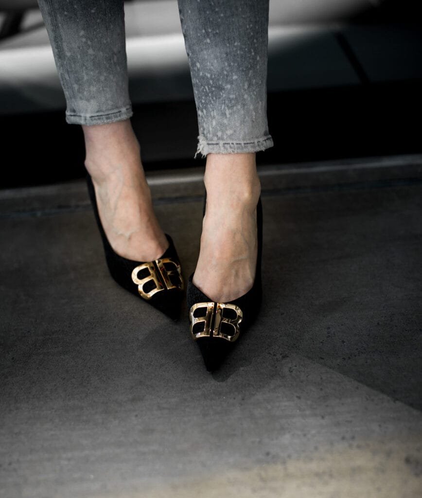 Balenciaga heels and gray skinny jeans