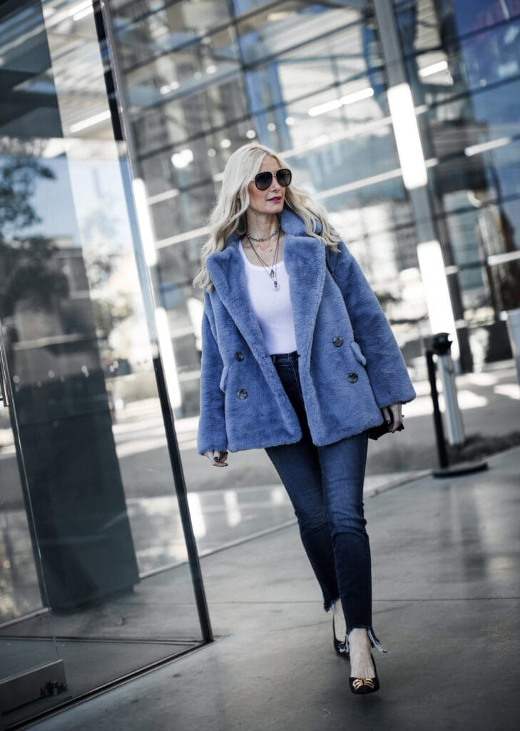 Dallas blogger wearing faux fur jacket and 3x1 black jeans