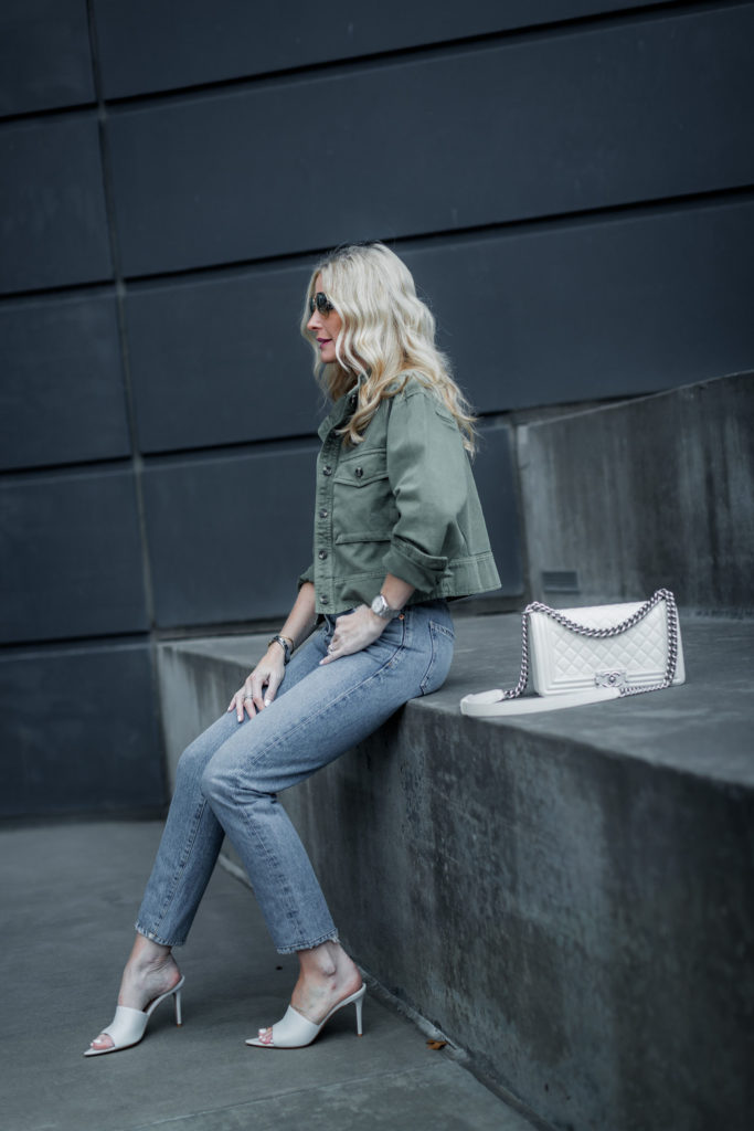 Dallas blogger wearing white Chanel Boy Bag and green military jacket 