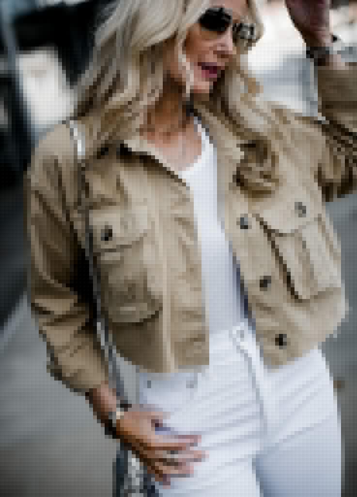 Dallas blogger wearing cropped utility jacket and white jeans