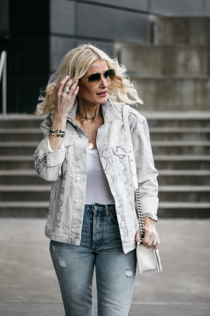 Dallas style blogger wearing Free People snake print jacket