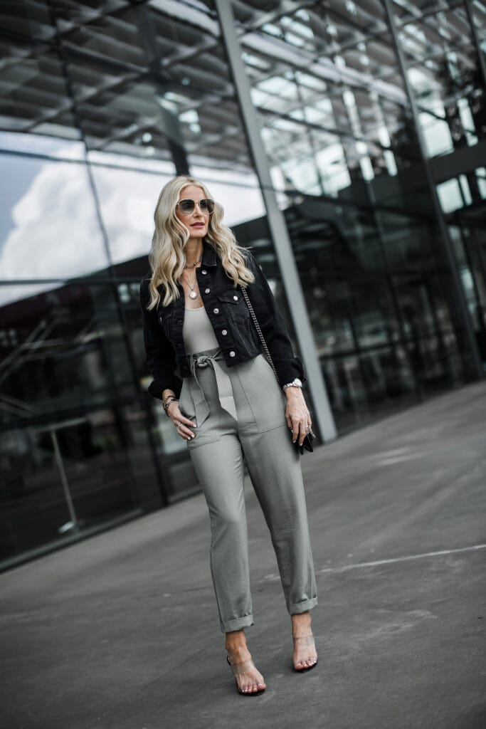 Dallas blogger wearing paper bag waist pants and denim jacket