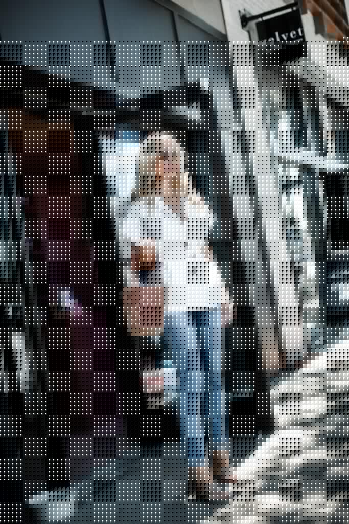 Dallas blogger wearing a white blazer and Moussy jeans