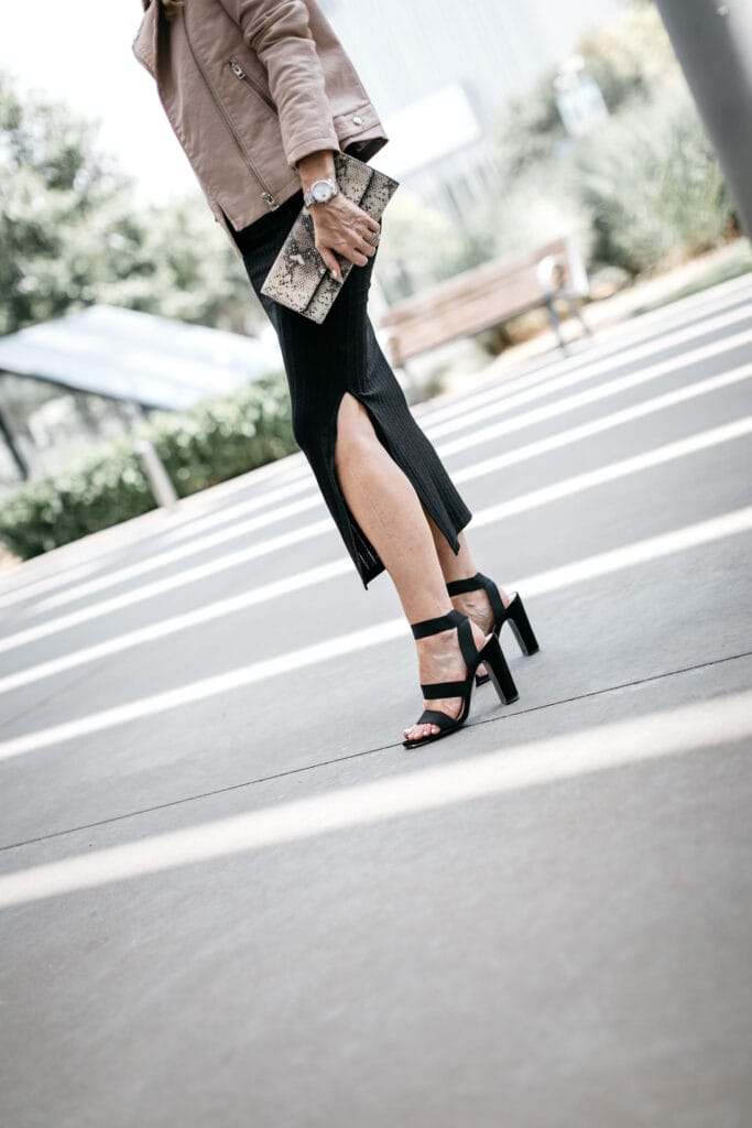 Dallas influencer wearing Steve Madden heels and a moto jacket