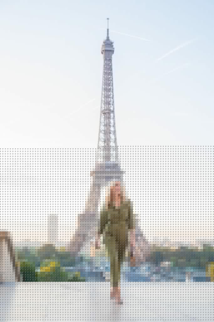 Dallas style blogger wearing a green jumpsuit in Paris