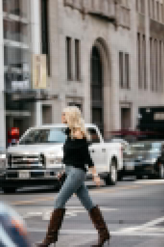 Dallas fashion blogger wearing snake print boots