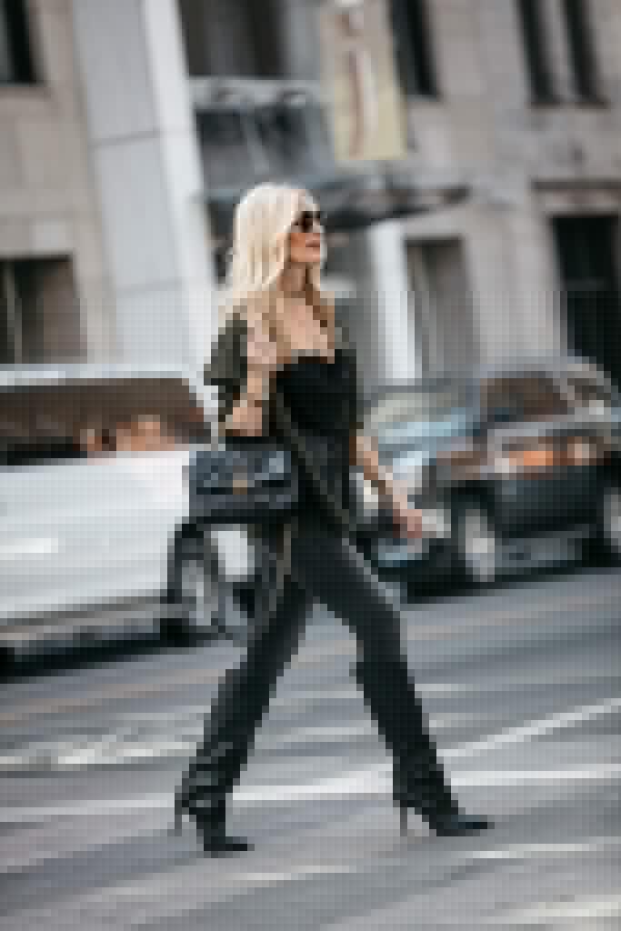 Dallas blogger wearing black denim and chanel handbag