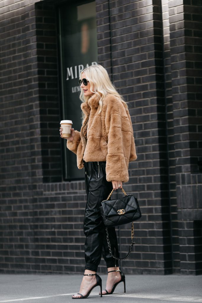 Dallas influencer wearing a faux fur jacket 