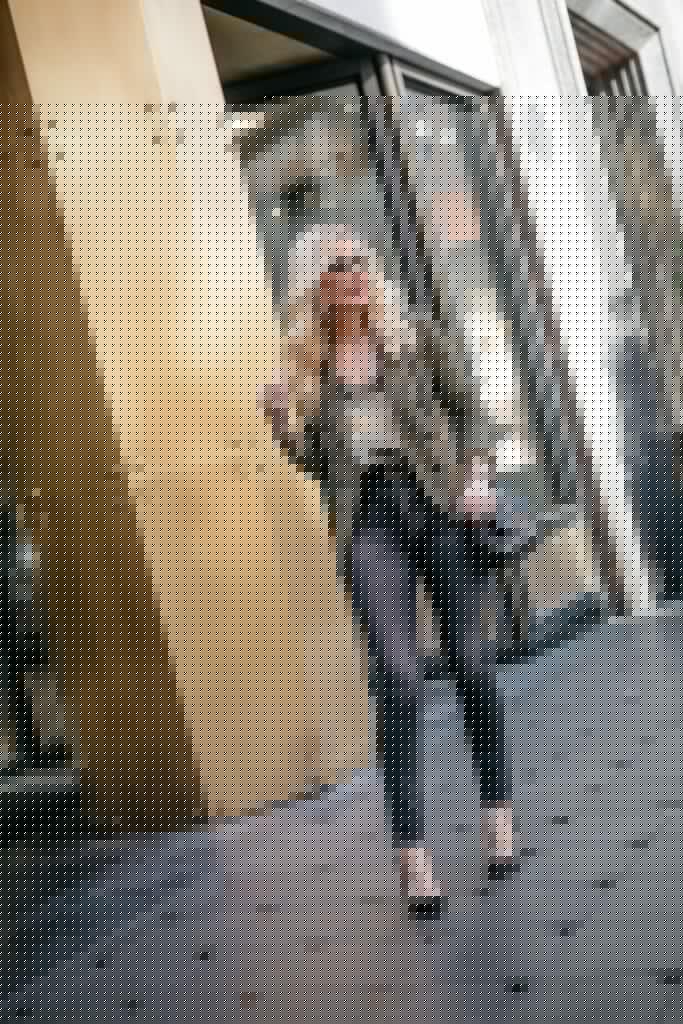 Dallas style blogger wearing black jeans with a black belt