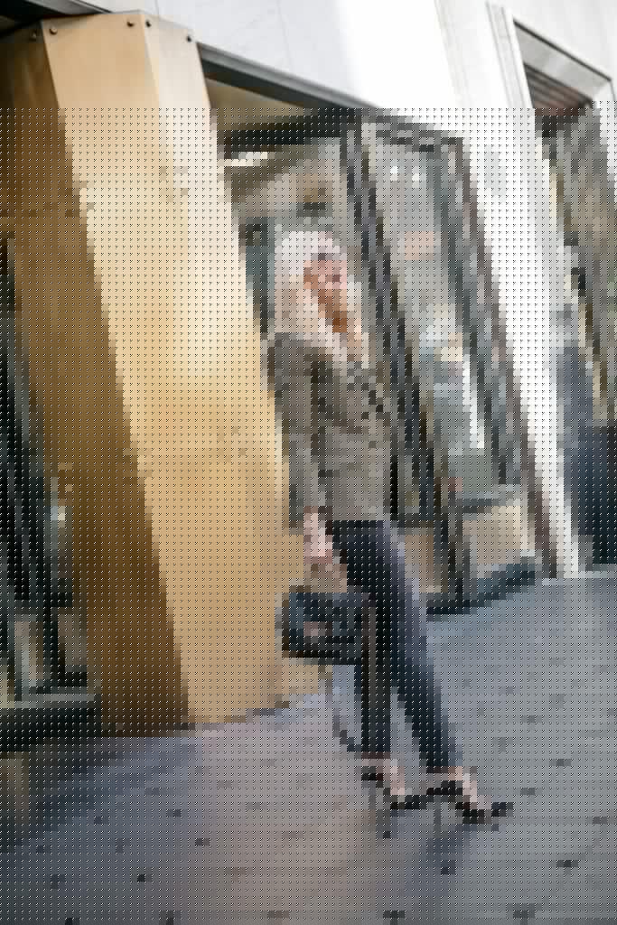 Blogger wearing an army green blazer