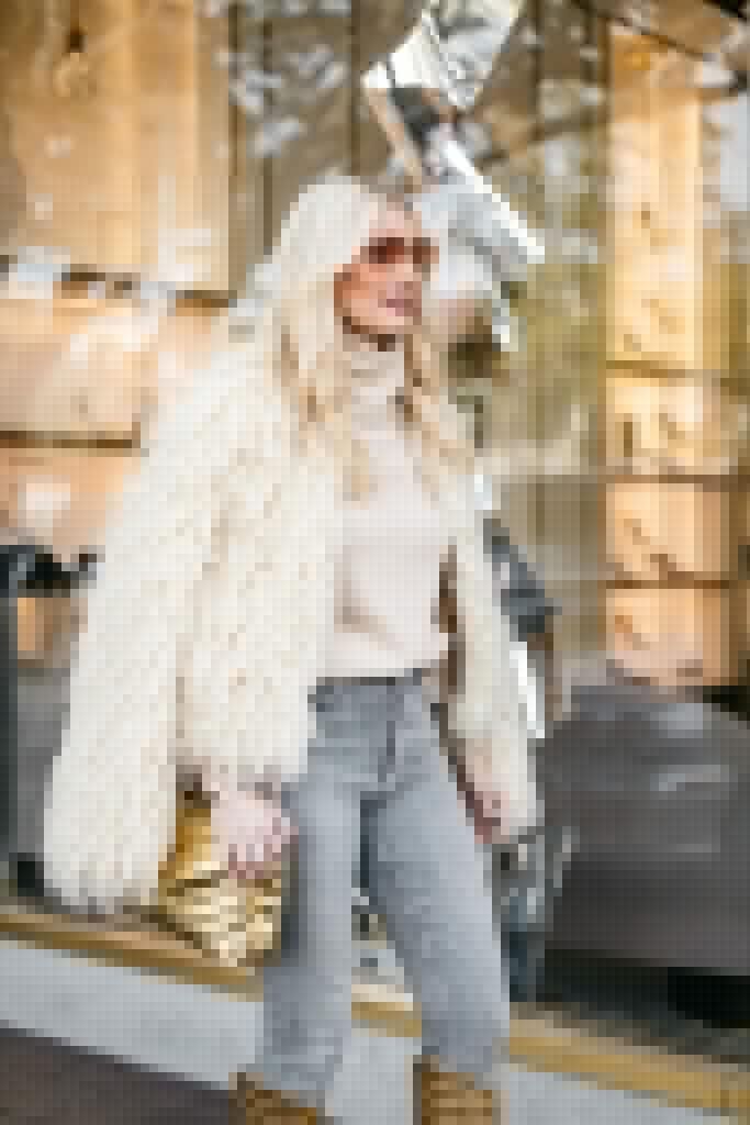 Dallas blogger wearing a faux fur jacket 