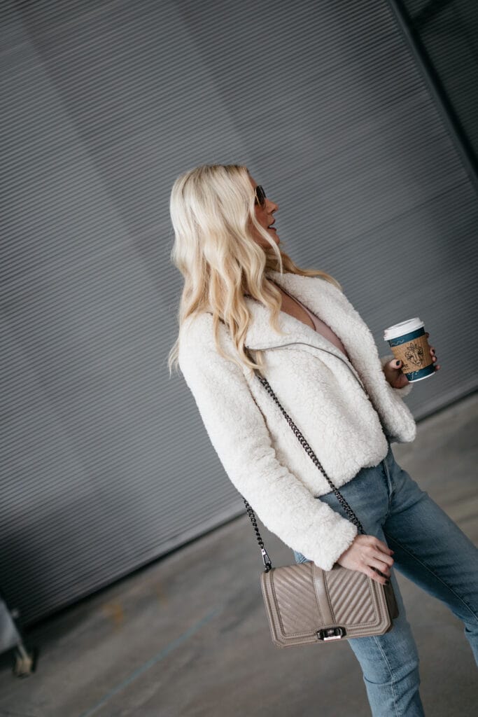 Dallas blogger carrying a Rebecca Minkoff handbag