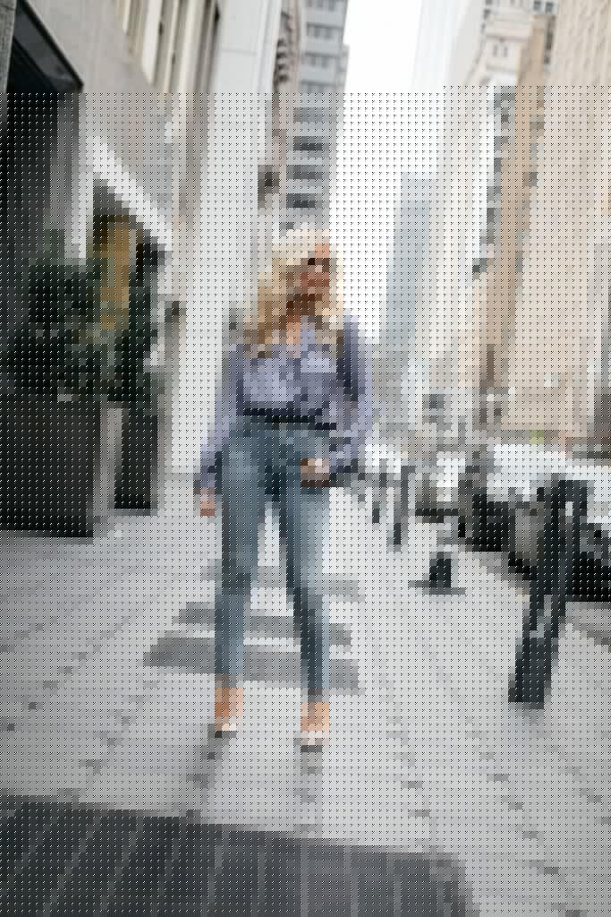 Dallas blogger wearing a blue bodysuit and blue jeans