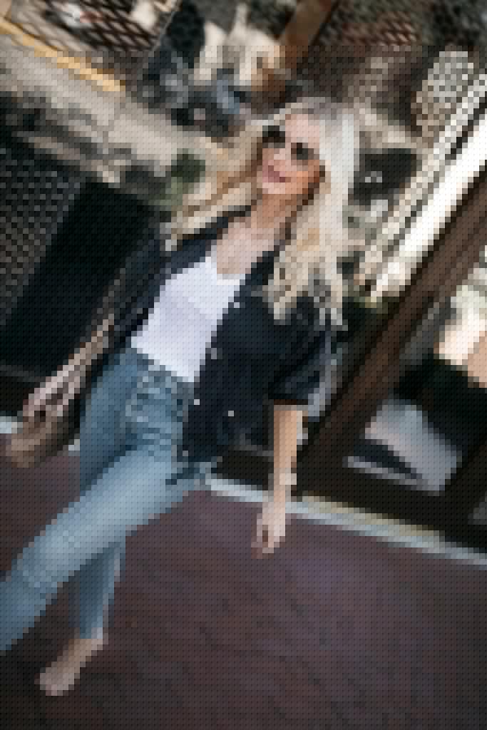 Style blogger wearing a jacket and a white tee