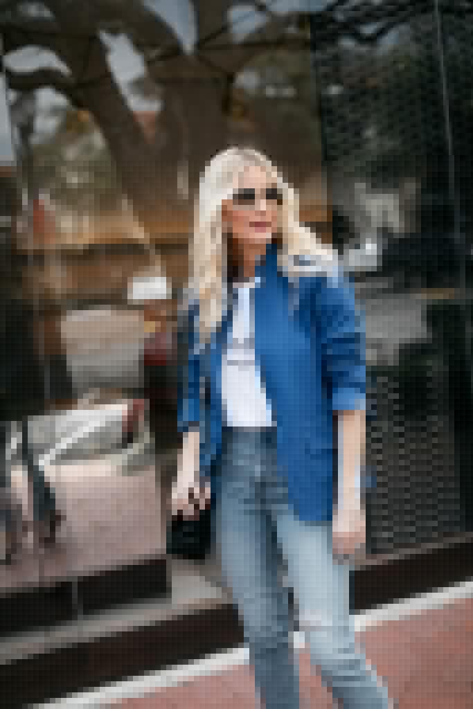 Dallas influencer wearing Gucci sunglasses and a blue blazer