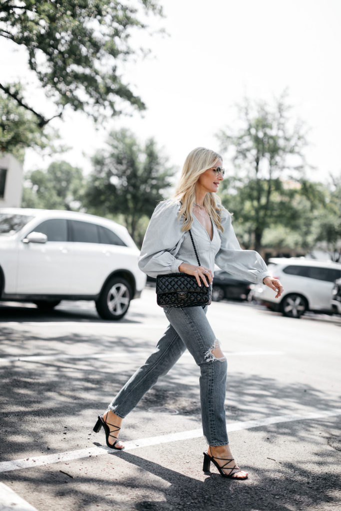 Style blogger wearing vintage denim and a denim puff-sleeve top