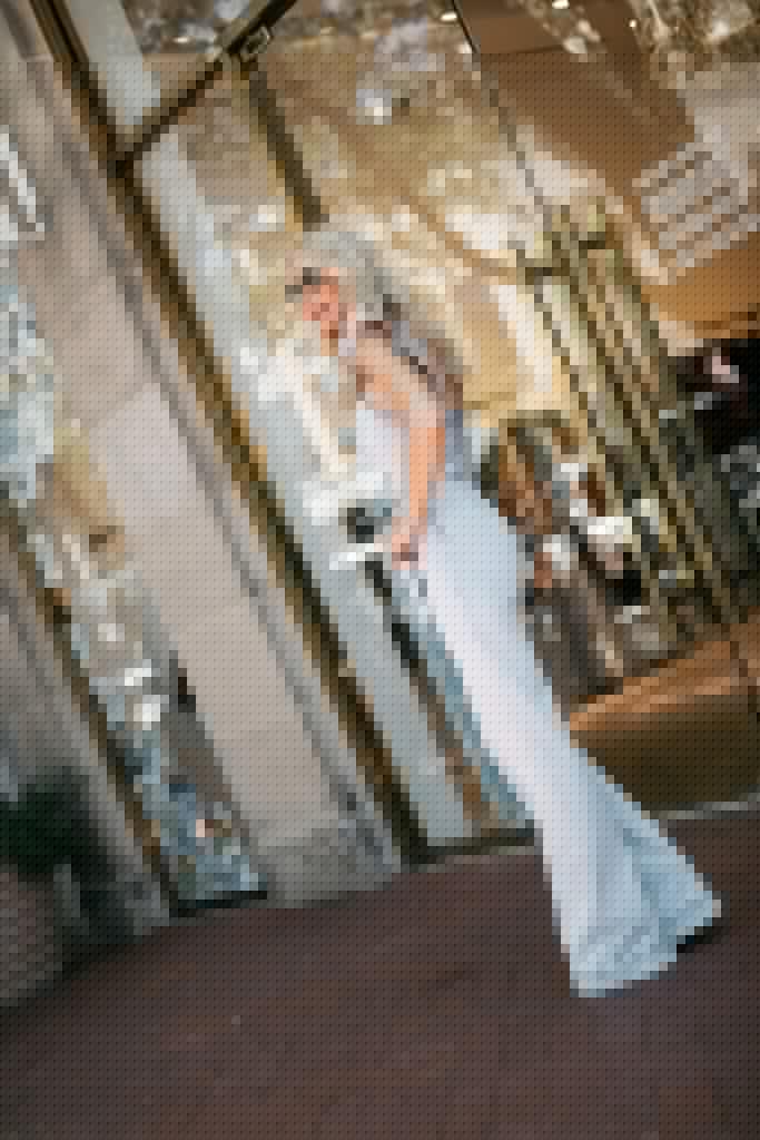 Dallas blogger wearing a flare denim jumpsuit by Alice and Olivia