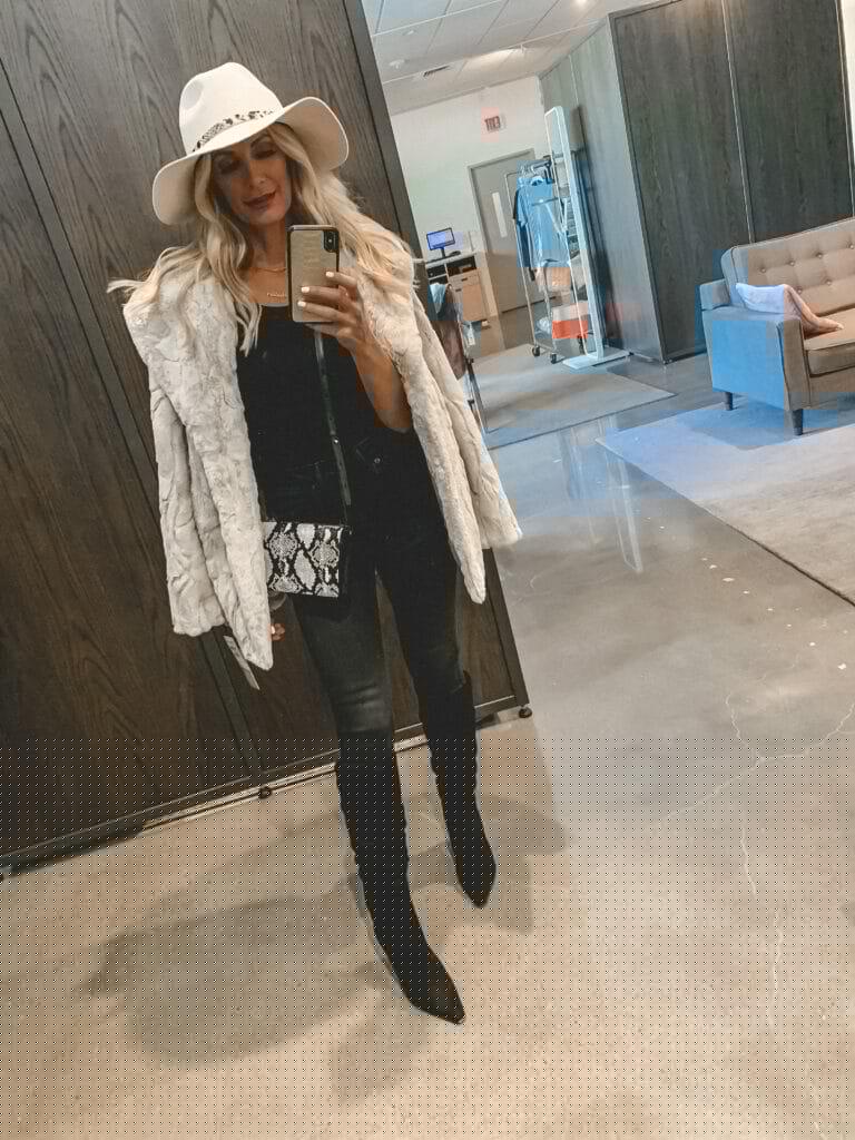 Dallas influencer wearing a fur coat and black denim