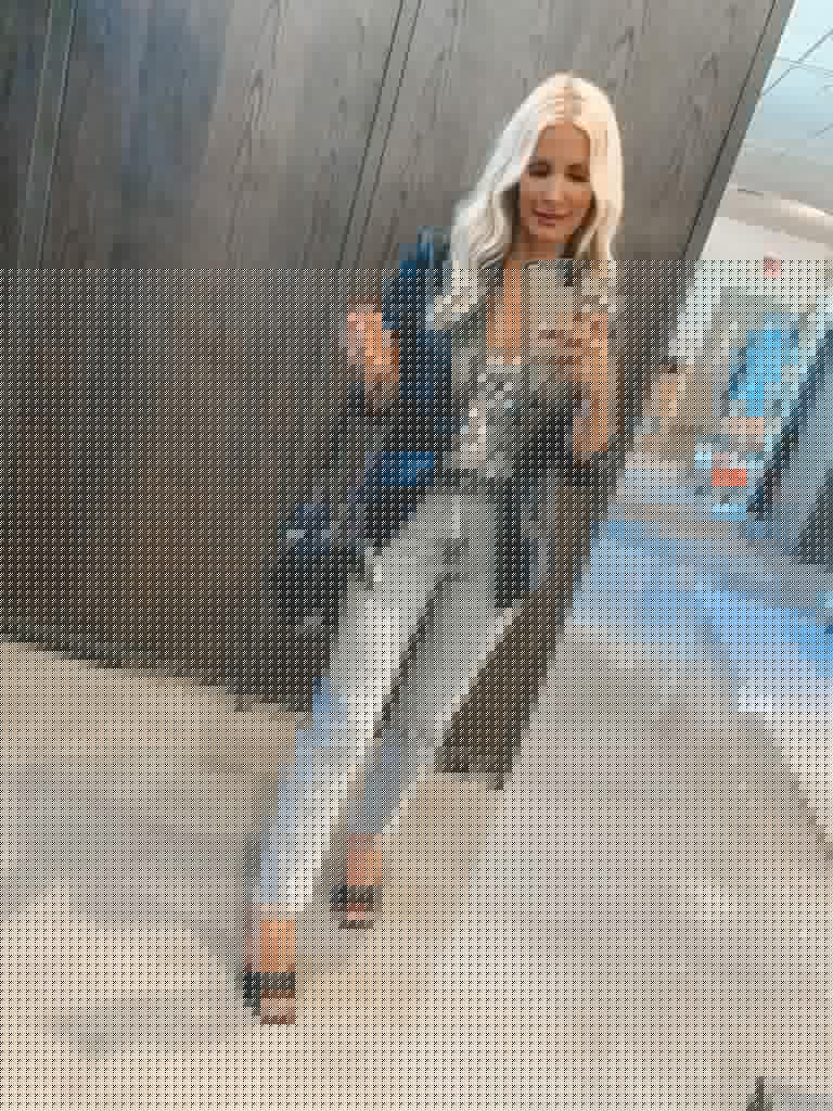 Dallas blogger wearing a black leather jacket and zebra tank