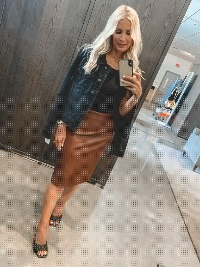 Dallas blogger wearing a brown leather midi skirt
