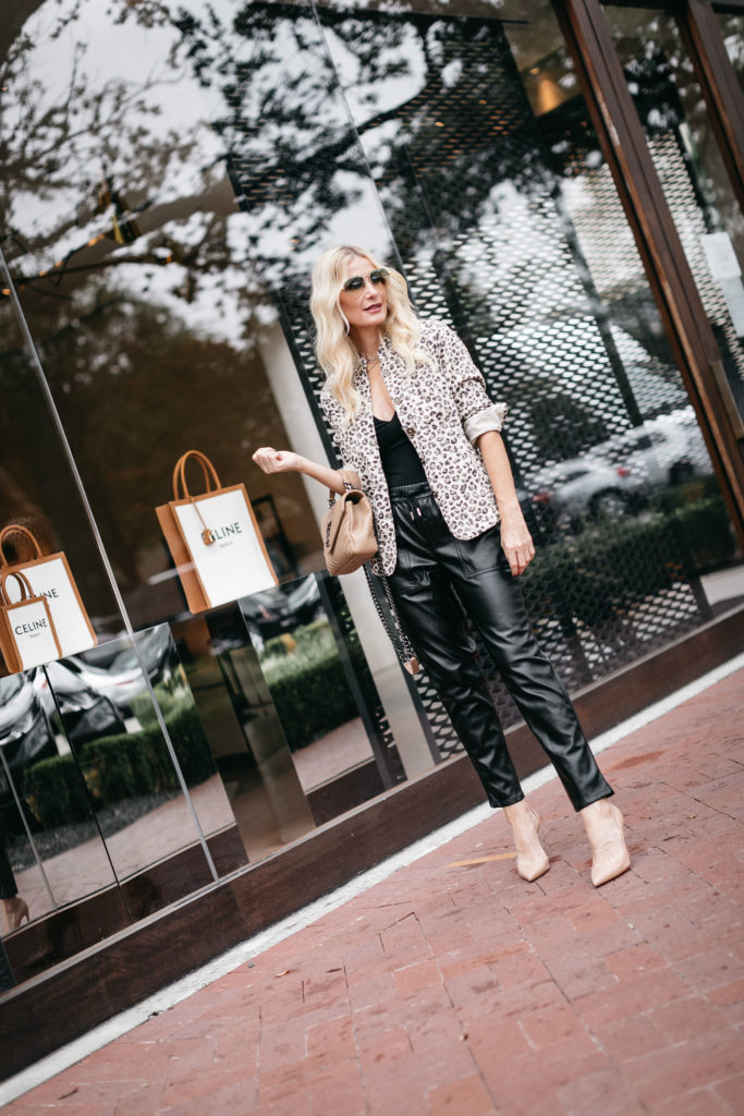 Dallas fashion blogger wearing black leather joggers and a black bodysuit