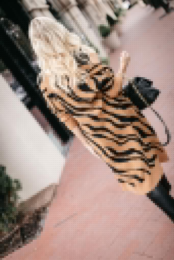 Fashion blogger wearing a zebra print cardigan for fall