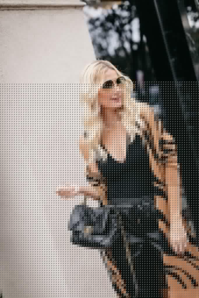 Dallas blogger wearing a rust cardigan and Chanel handbag for fall and winter