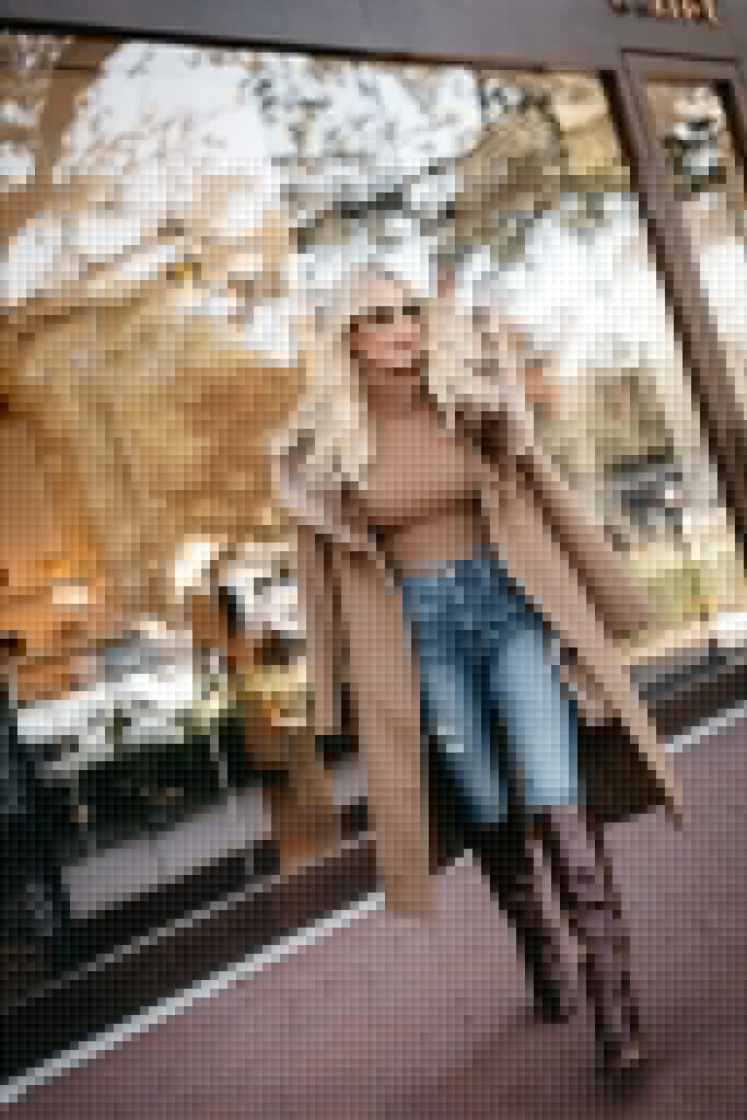Dallas blogger wearing a turtleneck sweater and a fur hooded coat