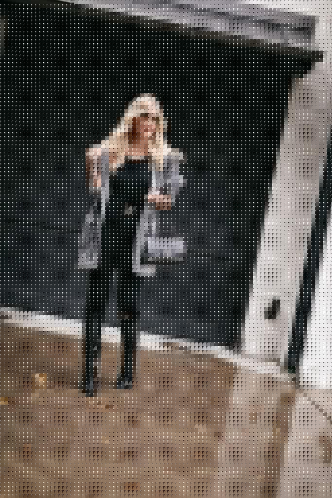 Dallas style blogger wearing a super soft leopard cardigan and black denim for fall