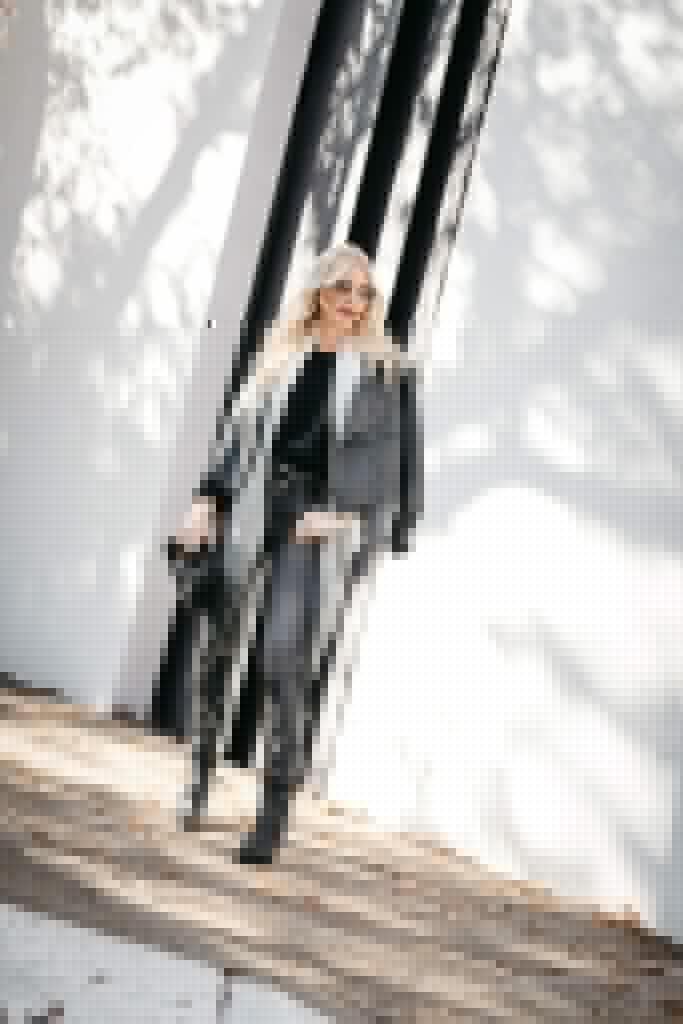 Dallas blogger wearing a black leather jacket and black leather boots