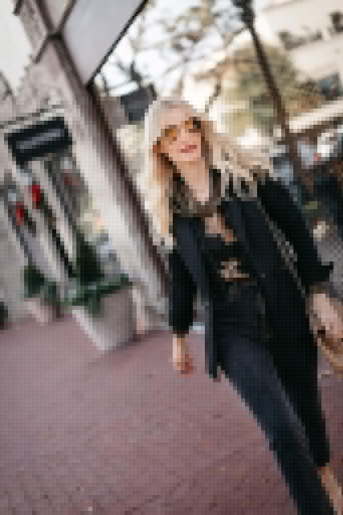 Dallas style blogger wearing a tie dye hoodie and a black blazer