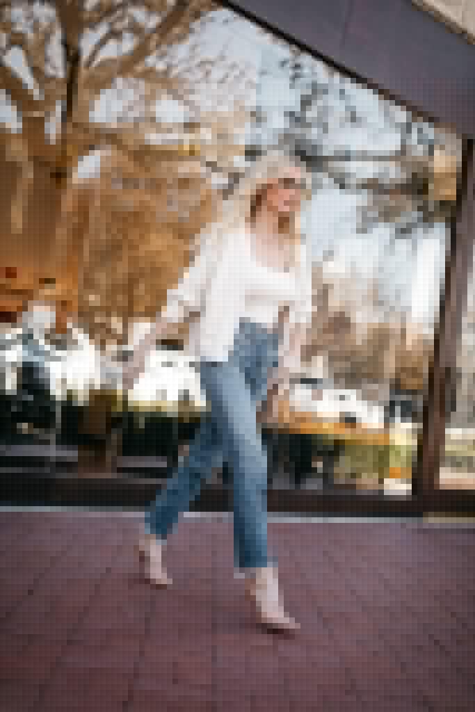 So Heather Blog wearing straight leg denim and a white cardigan set for date night