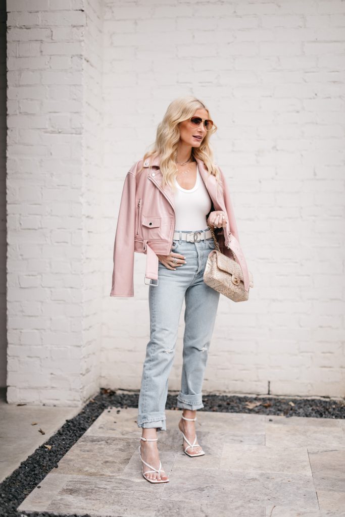 Dallas blogger wearing a white bodysuit and a pink leather jacket from Nordstrom 