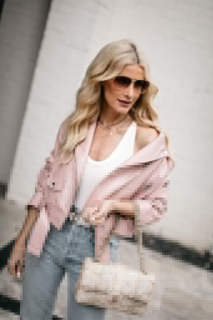 Dallas fashion blogger wearing a pink jacket and white bodysuit for spring and summer