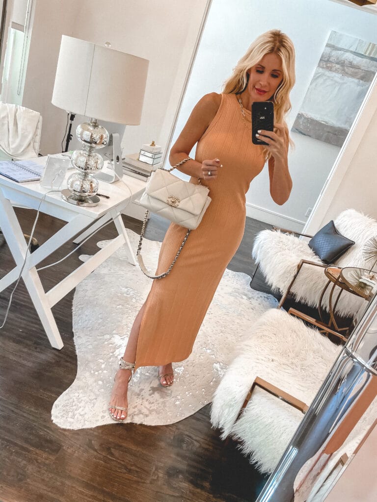 Dallas blogger wearing a midi dress and white Chanel bag for women over 40