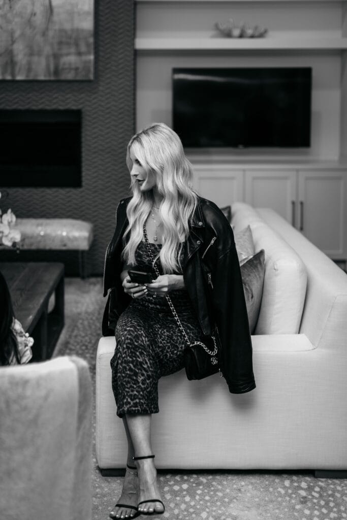 Dallas blogger wearing a leather jacket and a Chanel handbag