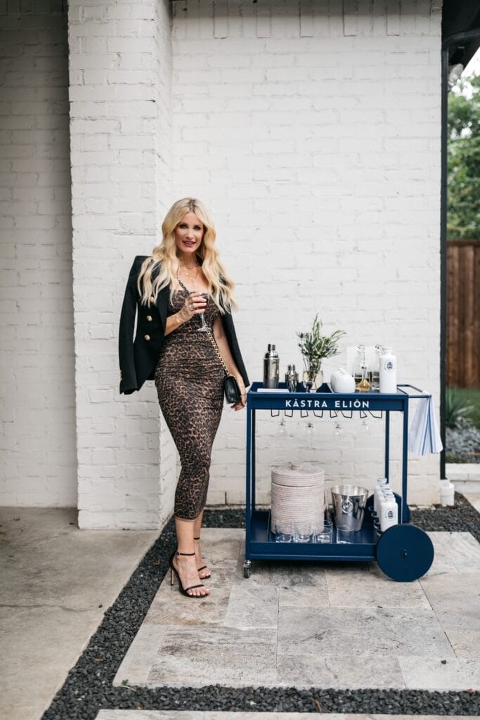 So Heather Blog wearing a Good American dress and black heels