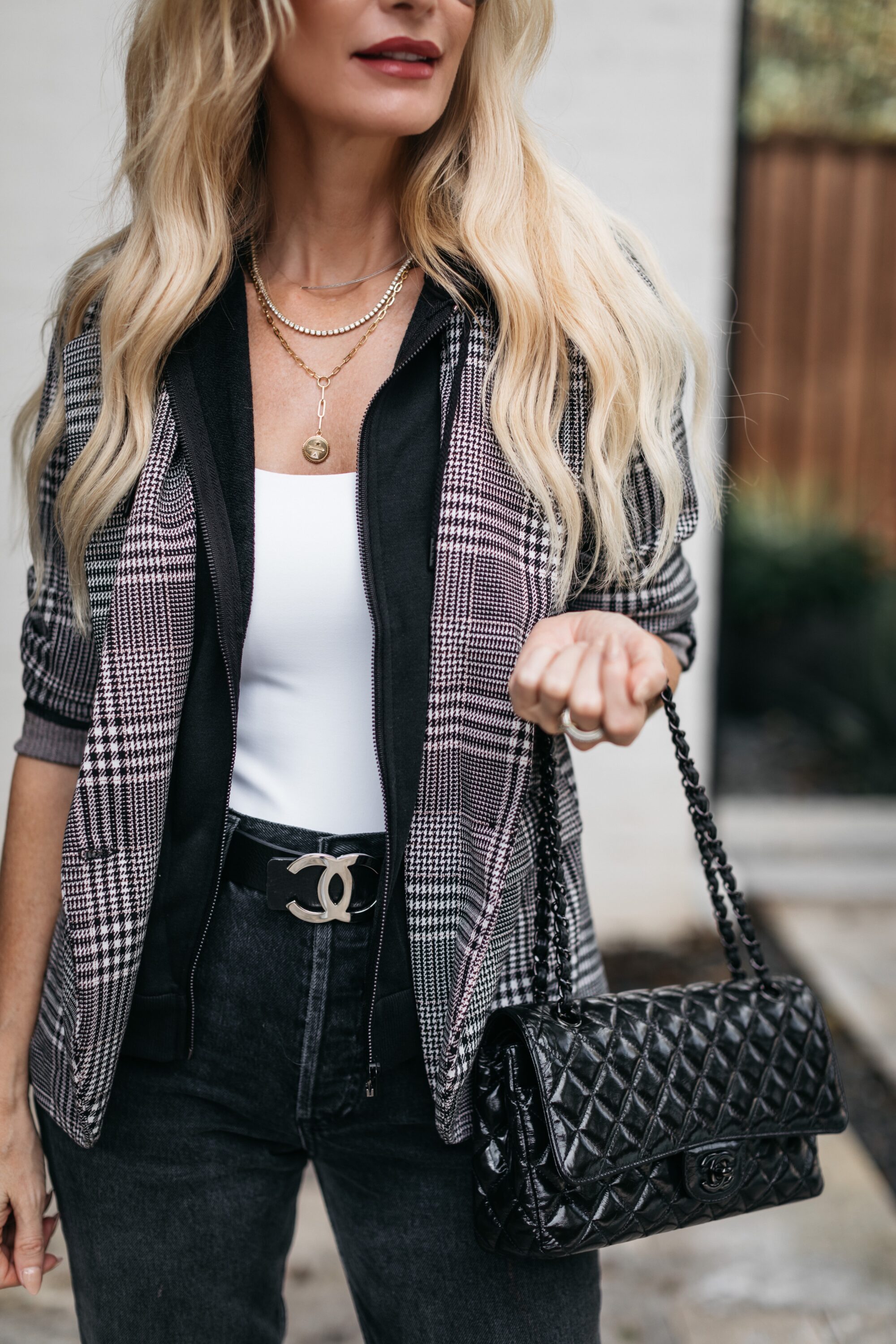 Dallas fashion blogger wearing a white bodysuit and a Chanel belt