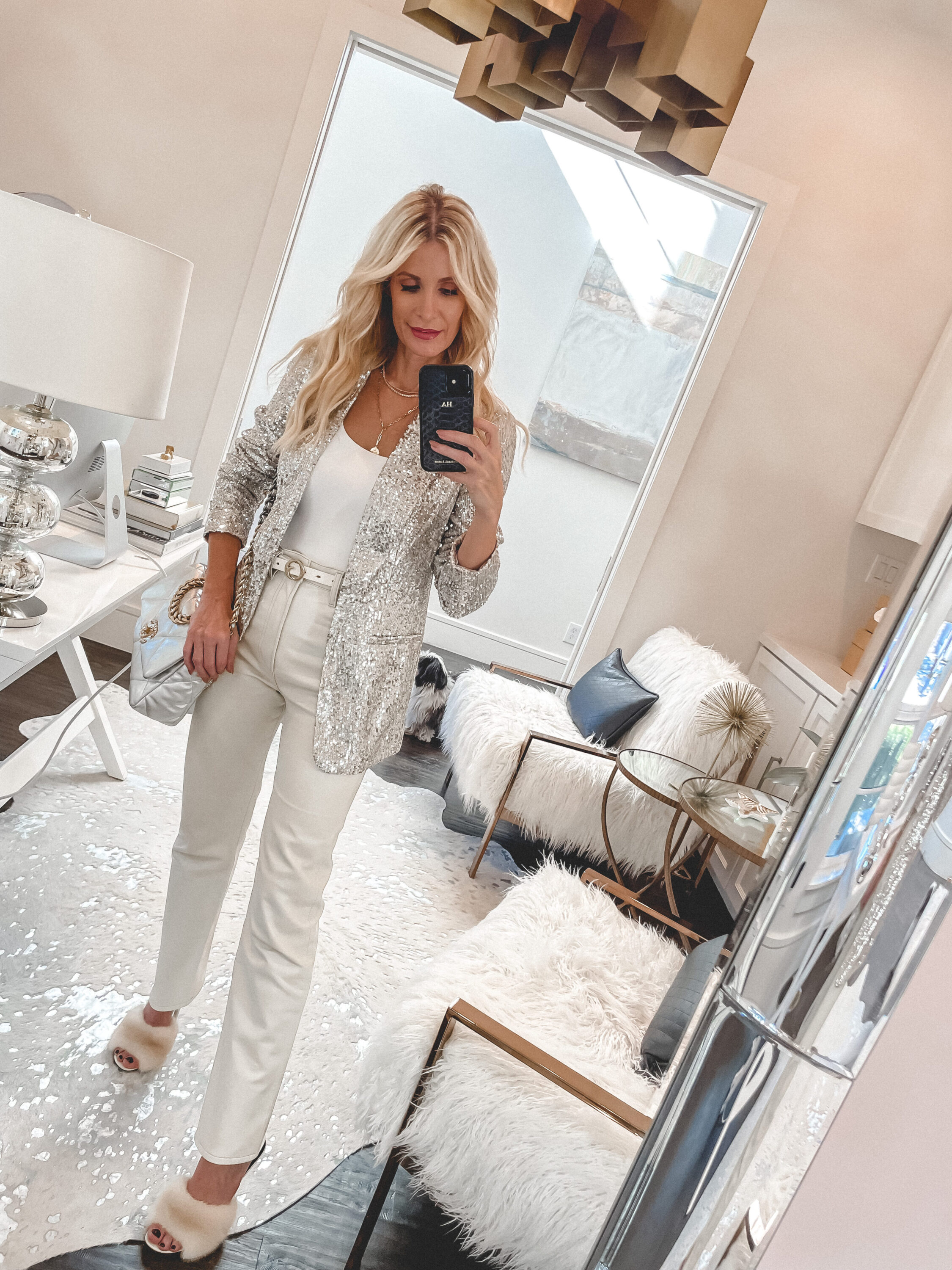 Dallas fashion blogger wearing a silver sequin jacket and white denim