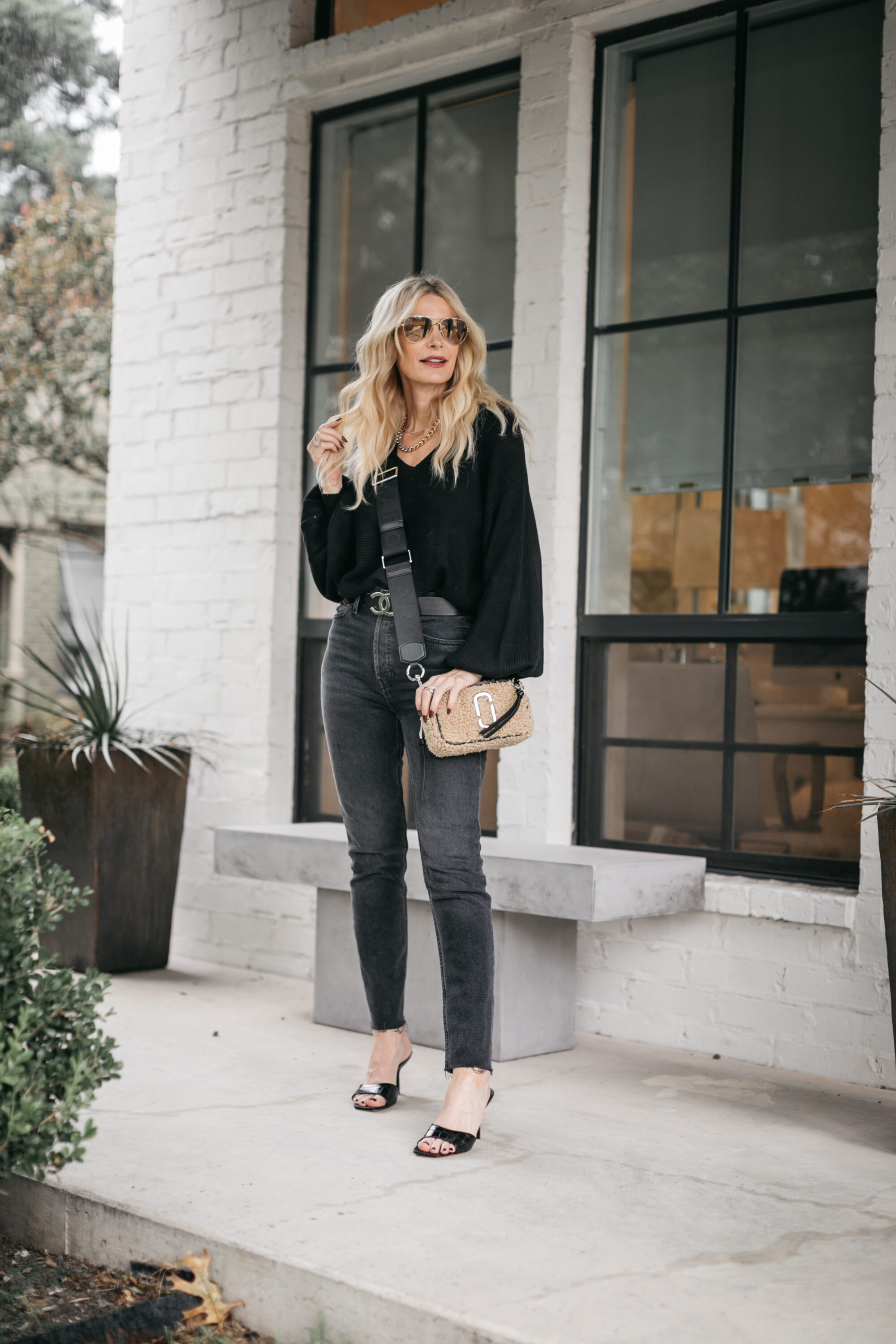 so Heather blog wearing black denim and a black sweater