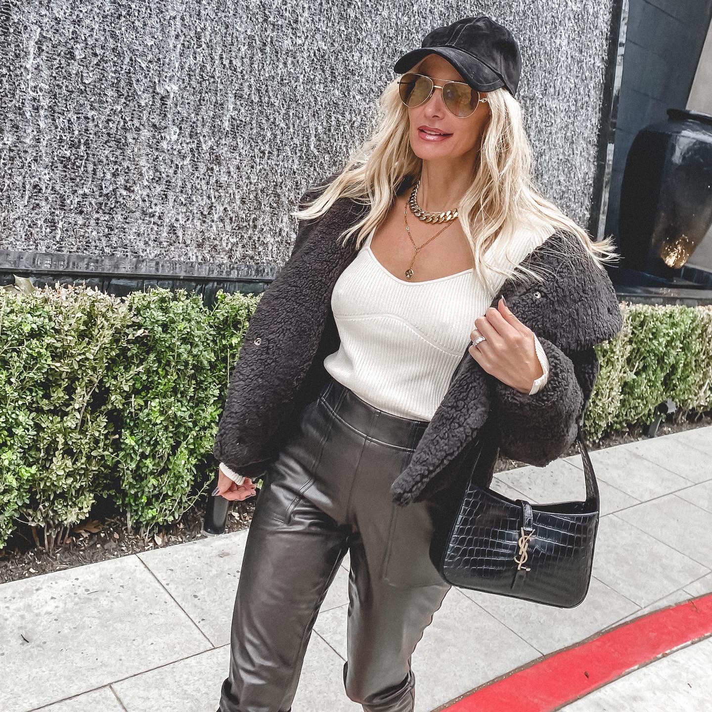 Dallas woman over 40 wearing faux fur jacket