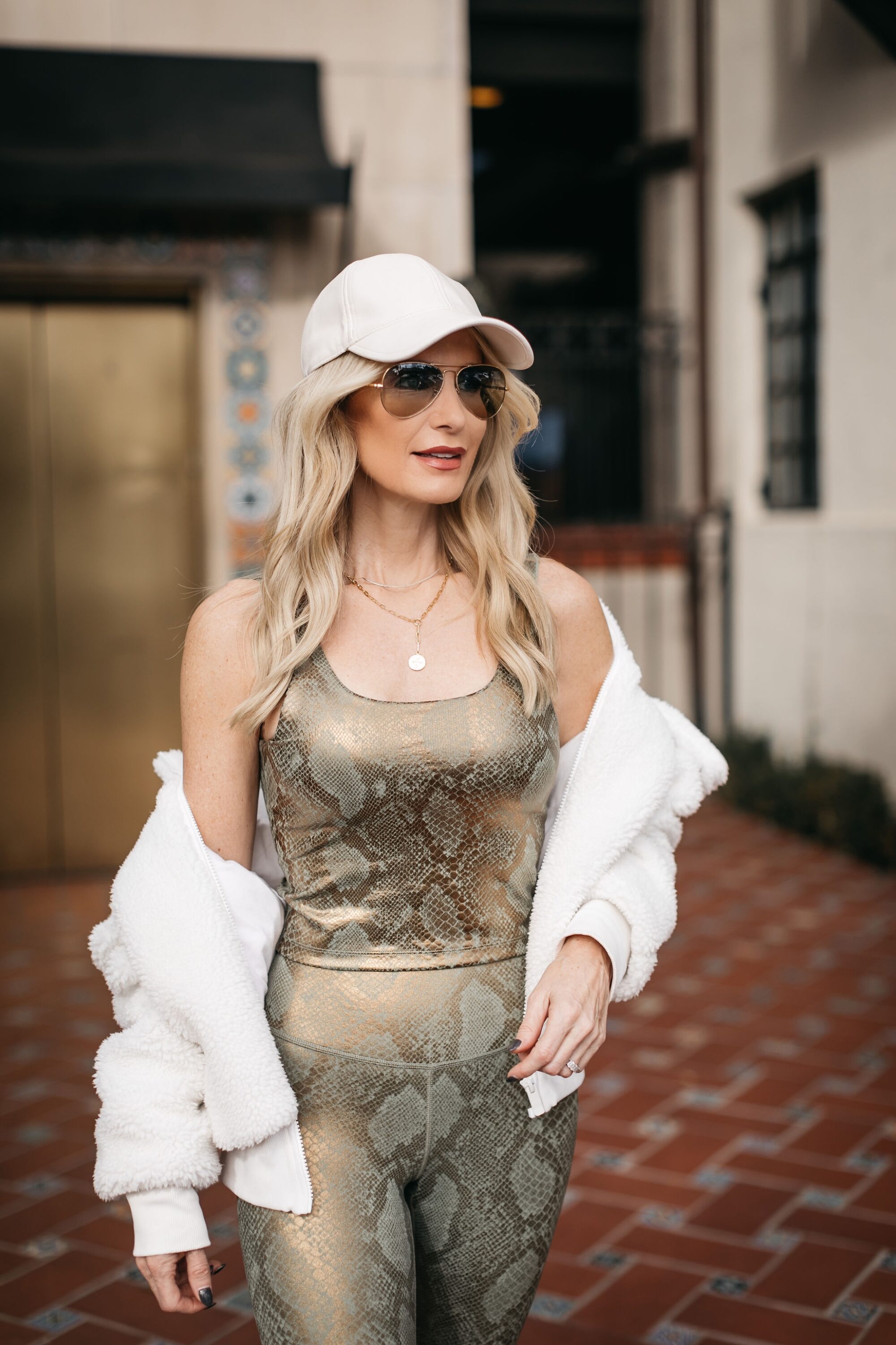 Fashion blogger over 40 showing work out wear